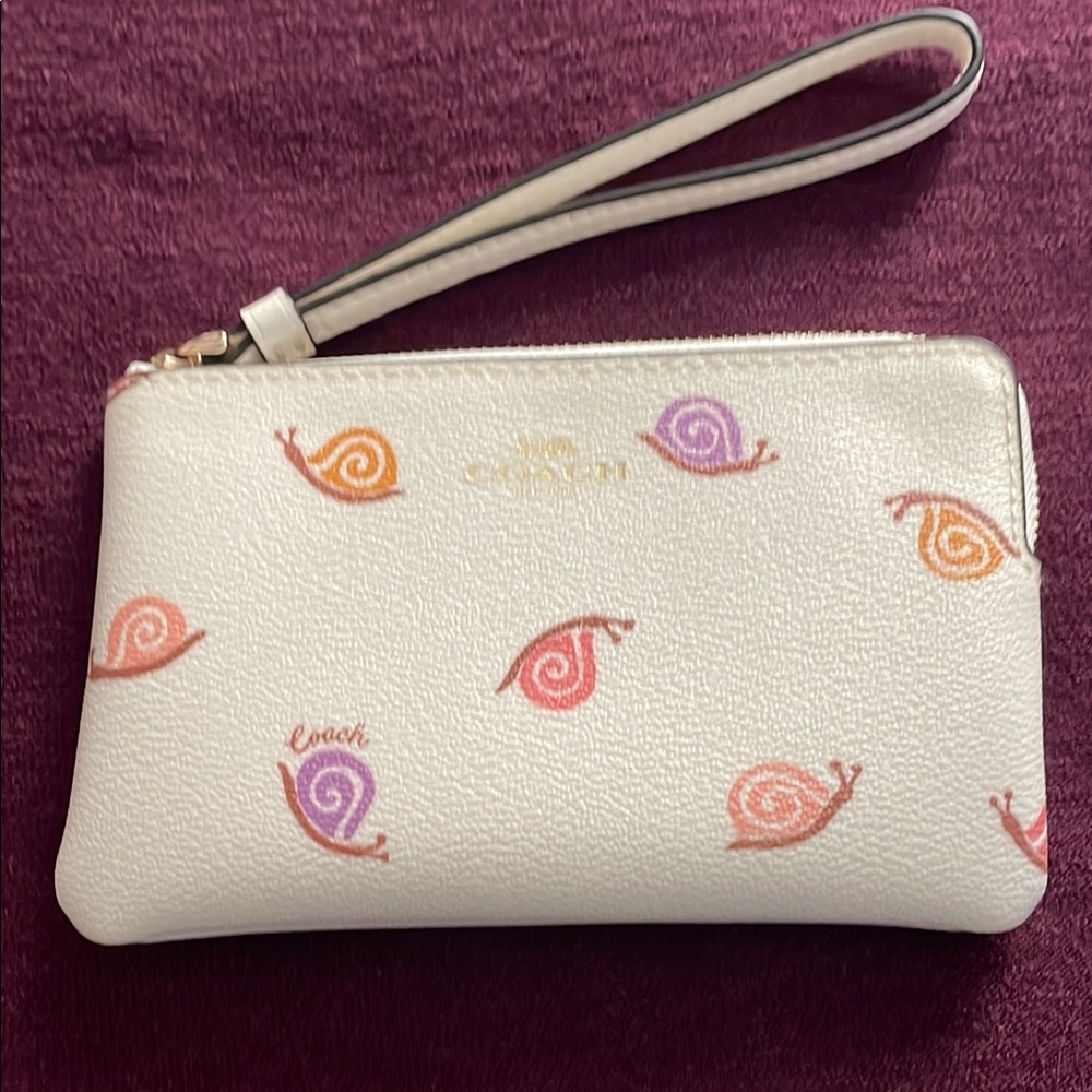 Coach Beige Wristlet with Colorful Snail Design